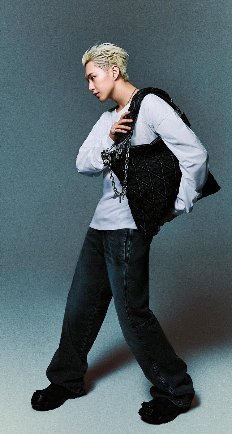 Hoshi wearing his capsule created in collaboration with Diesel