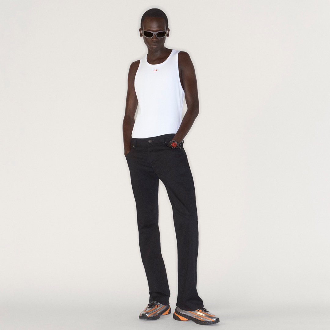 A man wearing Diesel jeans