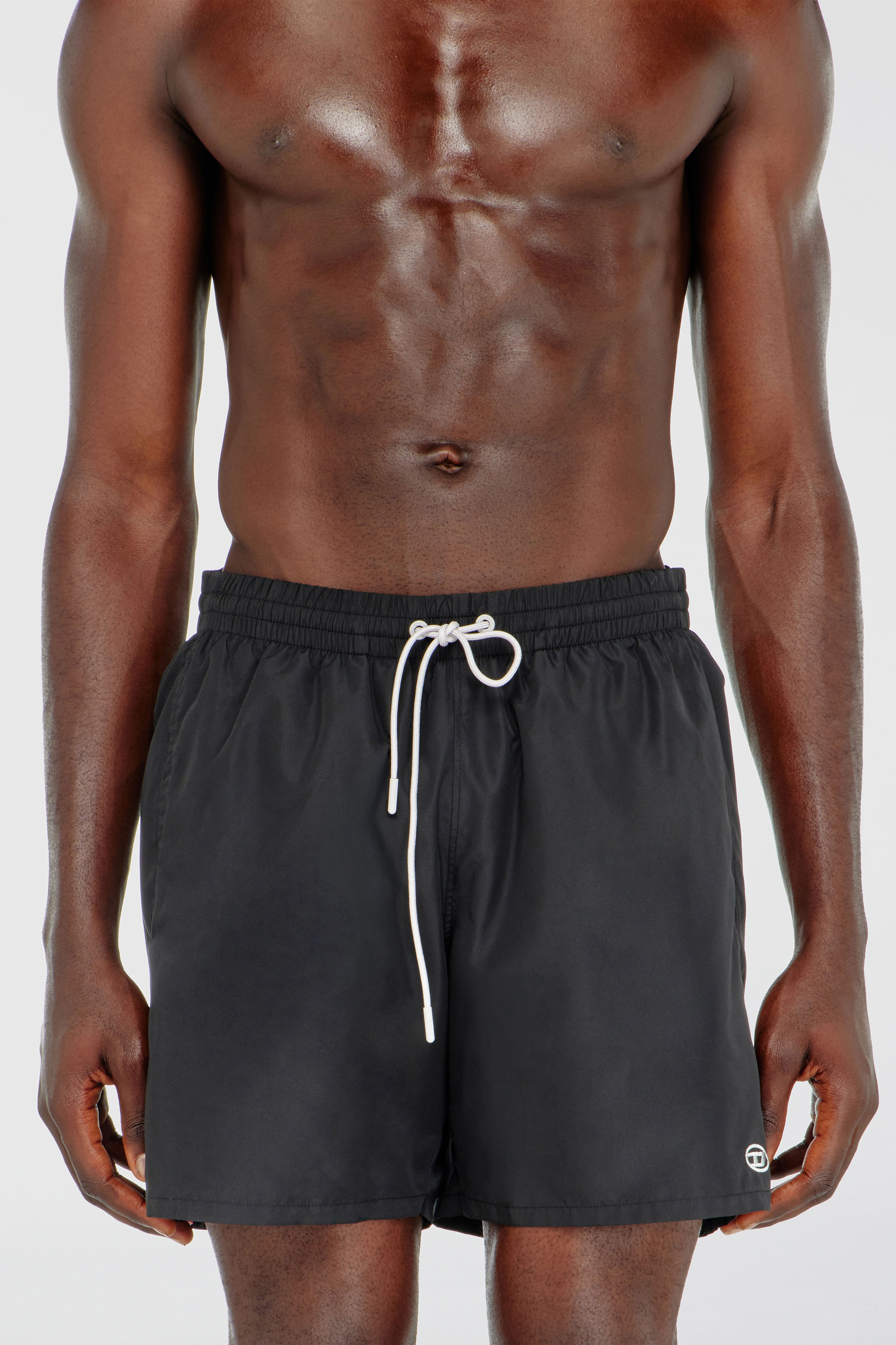 Swim shorts with metallic Oval D logo