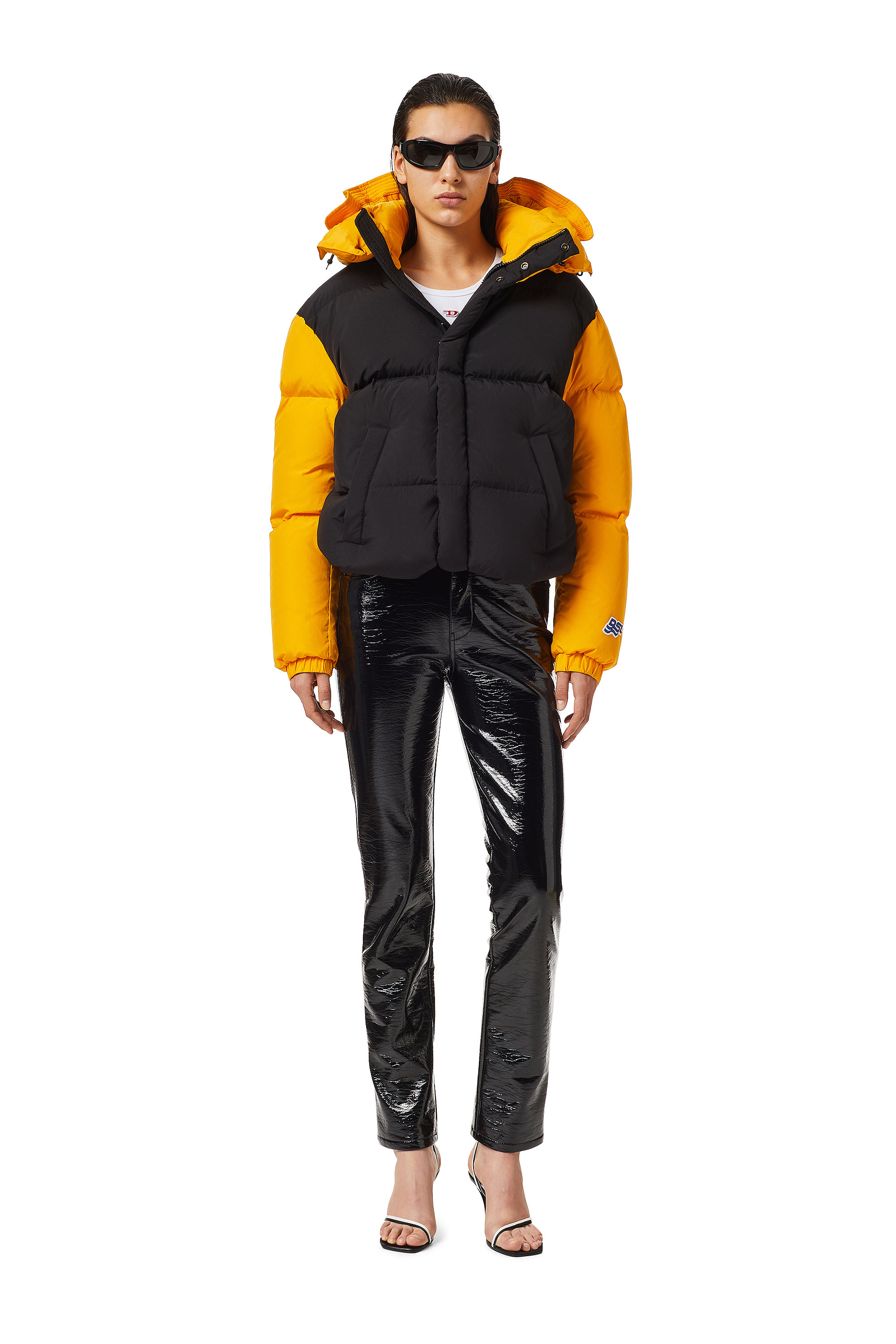 yellow and black puffer coat