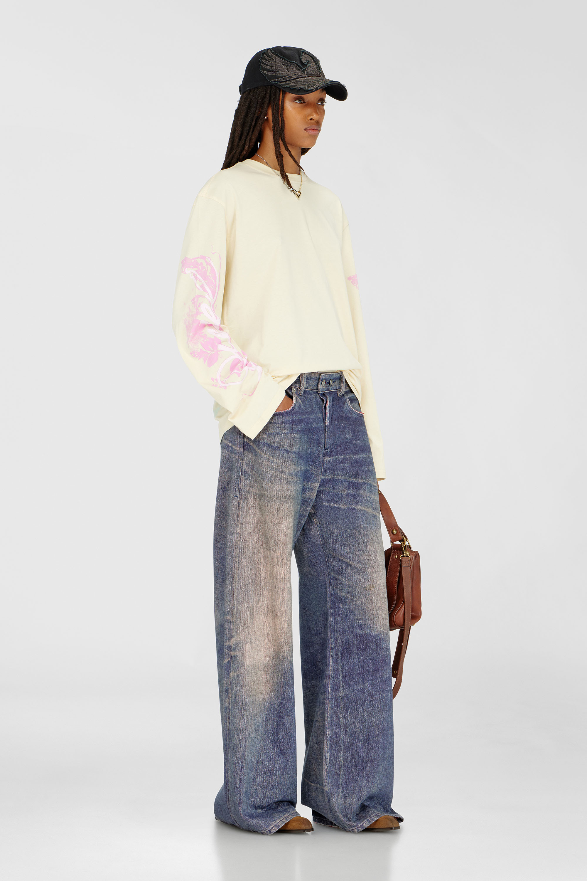 Diesel - T-HILARY-LS-AA3, Woman's Long-sleeve T-shirt with graphic prints and crystals in Yellow - 2