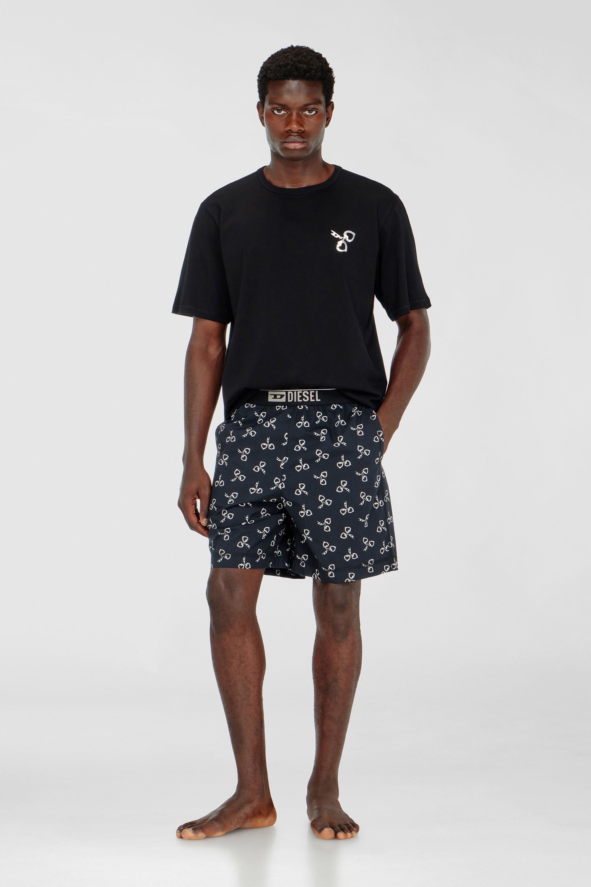 Cotton pyjama set with handcuff print